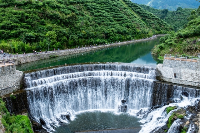 Cyclists pedaled through Xinyi's picturesque mountains and rivers.